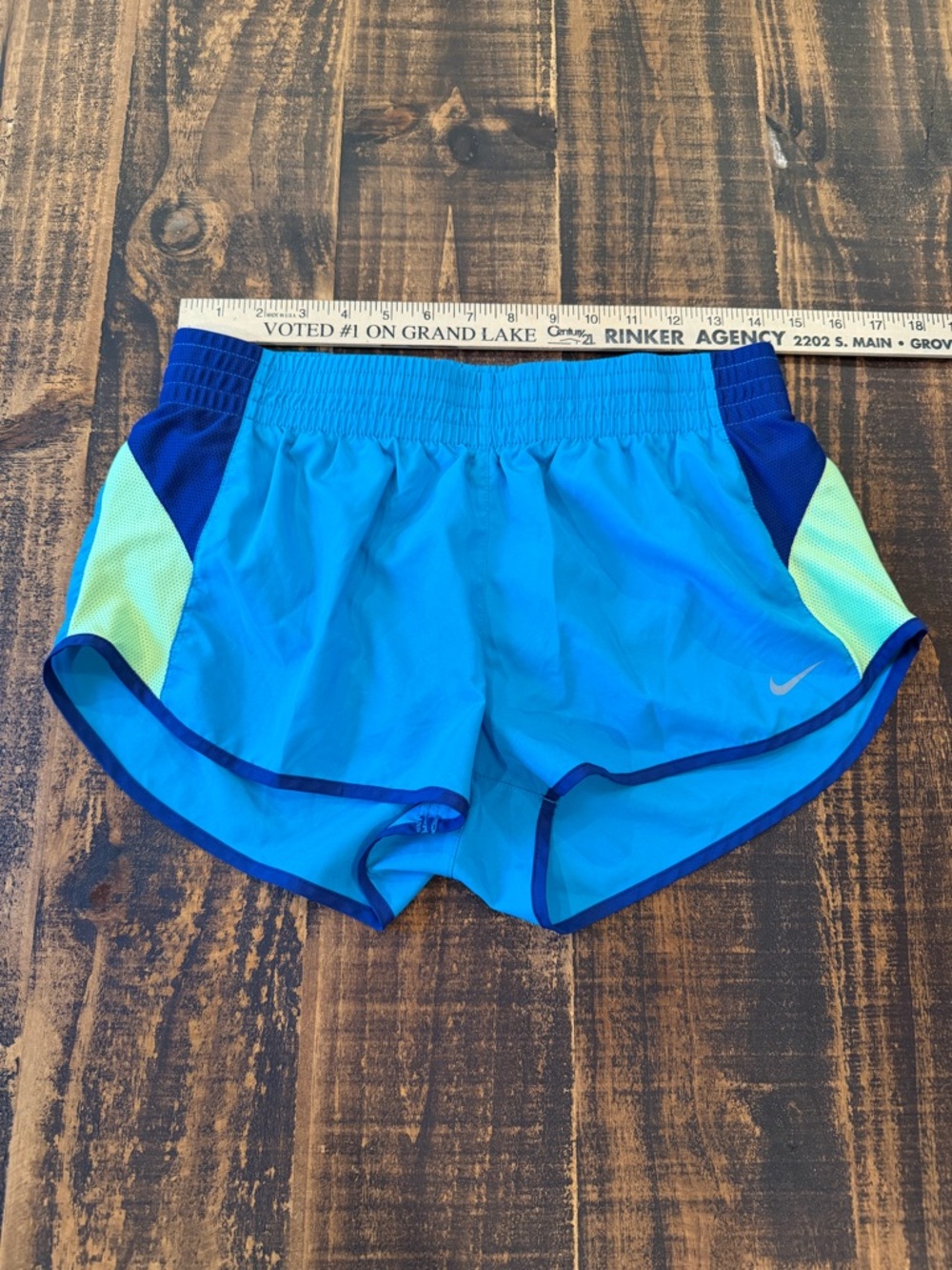 Nike Women's Bright Blue Running Shorts with Navy Trim and Neon Green Panels